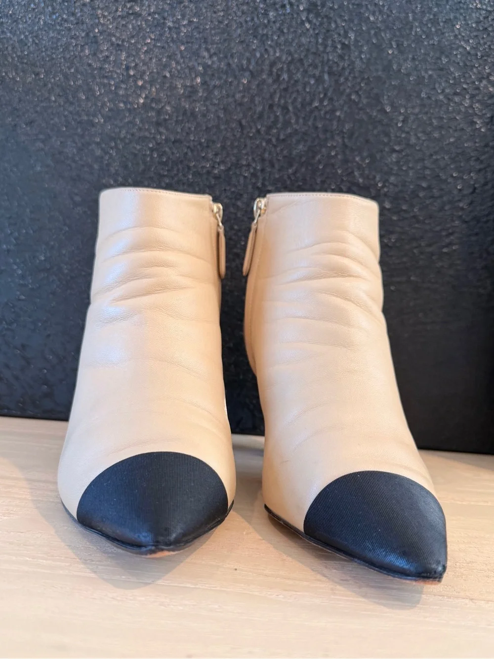 CHANEL Beige Leather Ankle Boots with Black Cap Toe